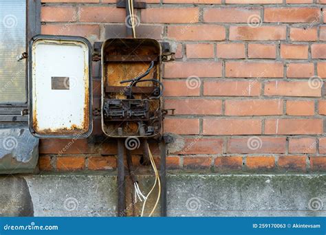 broken electrical boxes gray outside driveway|broken electrical box.